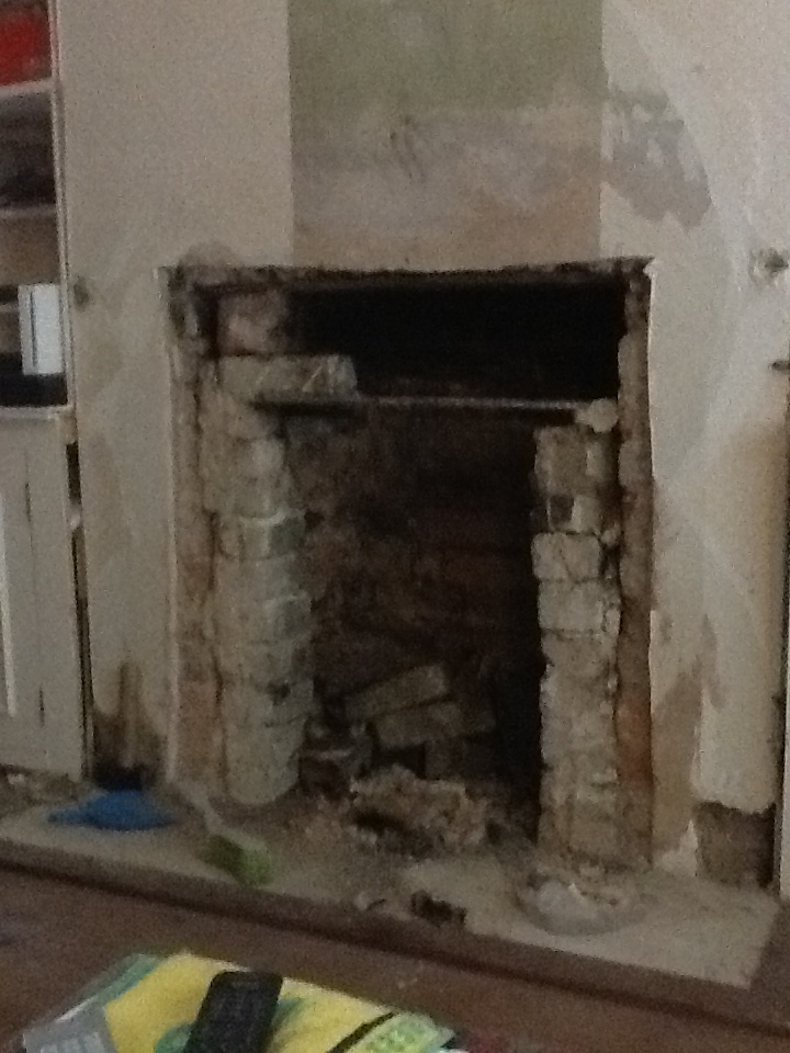 Removal of the first bricks.JPG